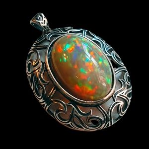 Outrageously Large Gorgeous black opal Pendant